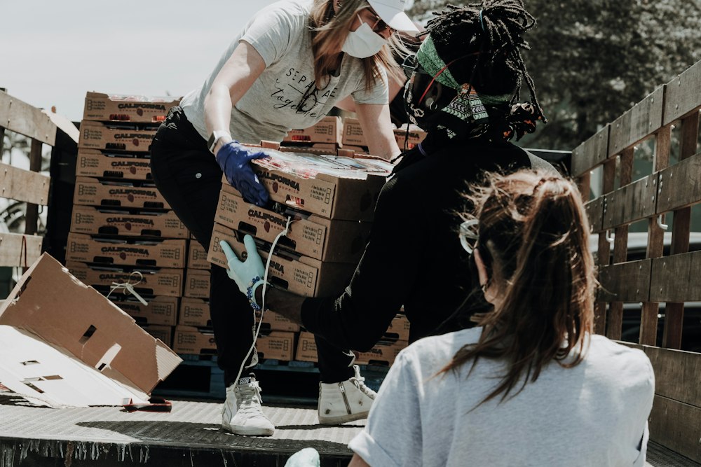 Volunteers distributing health kits